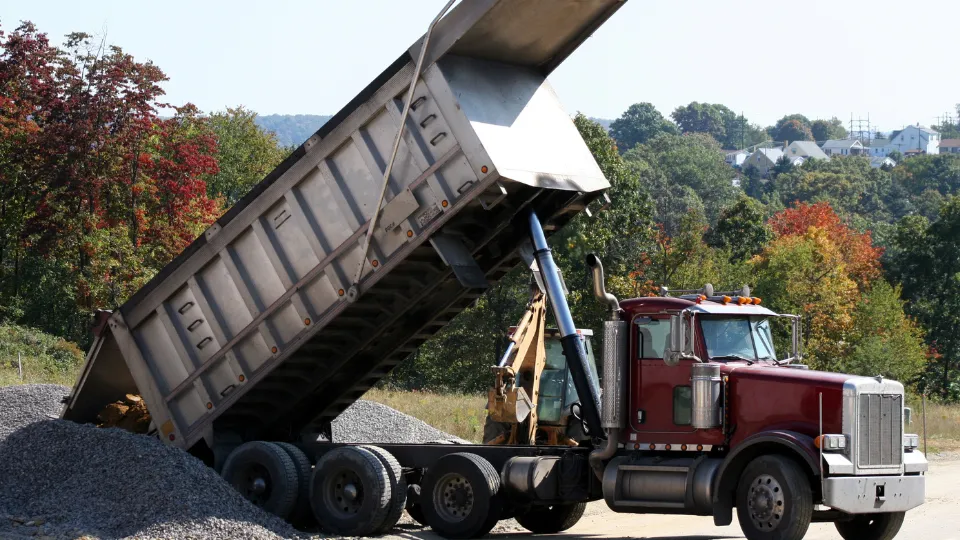 A&E Logistics dump truck hauling material