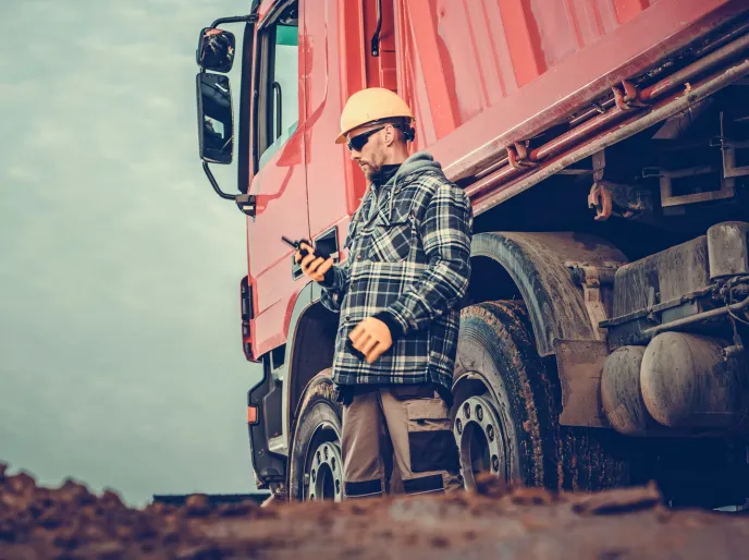 Owner operator dump truck at a job site